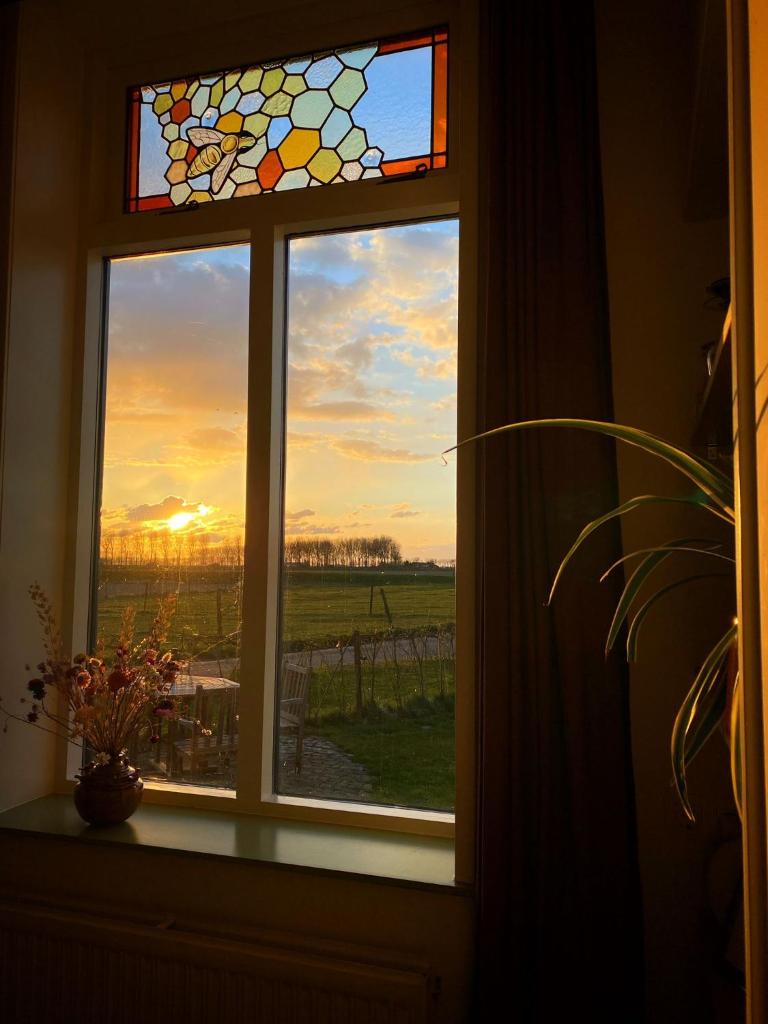 Huisje op Bioboerderij, kust, polder en rust photo 1