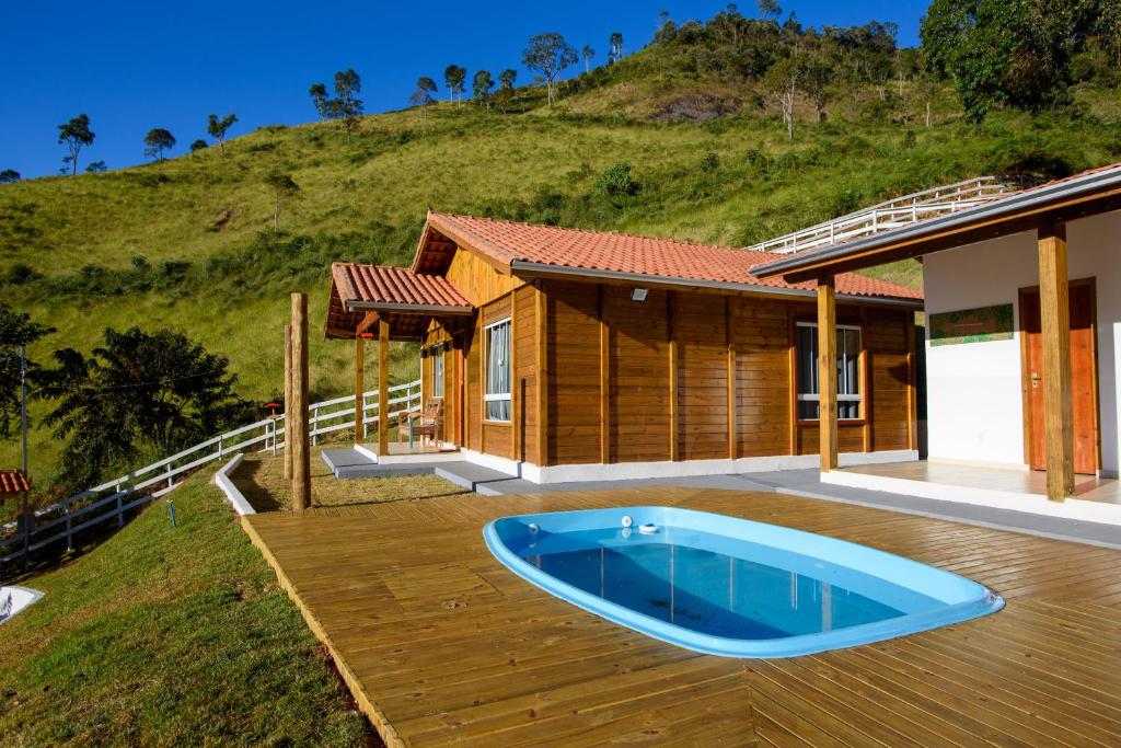 Recanto Águas Nascentes - Casa na serra com piscina e cachoeira no quintal!! photo 4