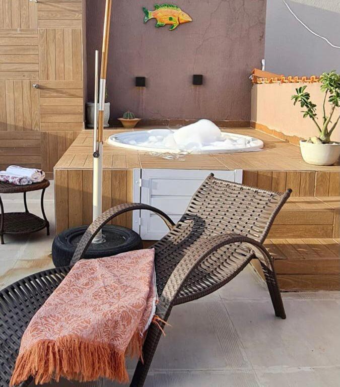 Relaxe na banheira de hidromassagem com vista mar photo 2