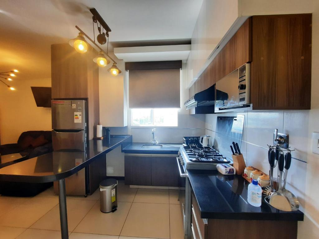 Lujoso Apartamento Nuevo, cerca de todo, moderno 100% amoblado con Netflix, Parqueo gratuito y WIFI. LUXURY photo 4