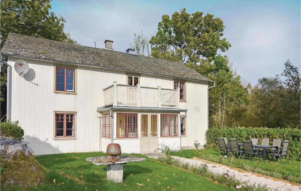 Nice home in Mellerud with 4 Bedrooms and WiFi