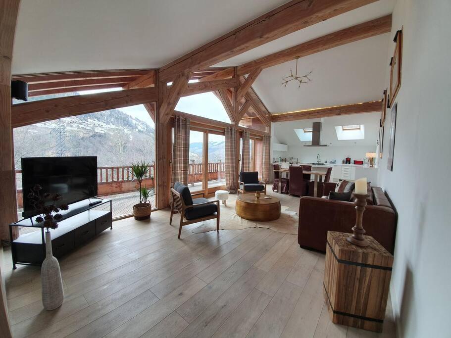 Chalet entier 110m2 avec vue et sauna à 10 min des pistes photo 2