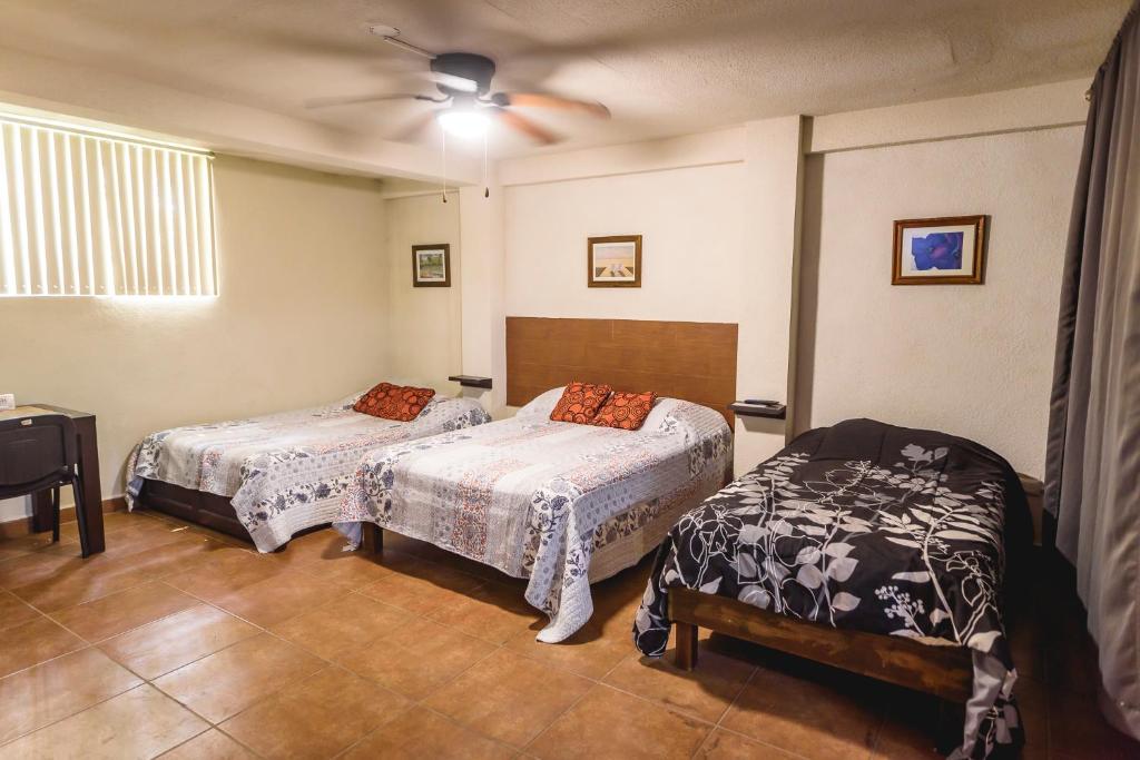 Suite con 2 recamaras,2mini splits, Parking Wifi 100 mb, cocina