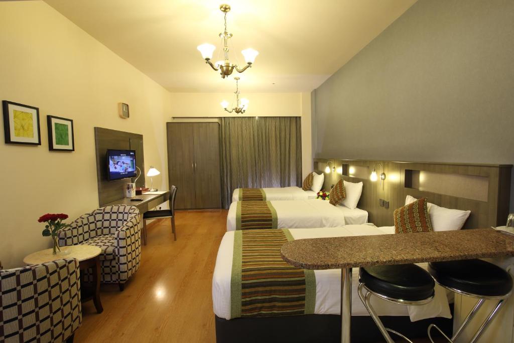 Студио (Трехместный номер-студио с мини-кухней), Апарт-отель Flora Hotel Apartments