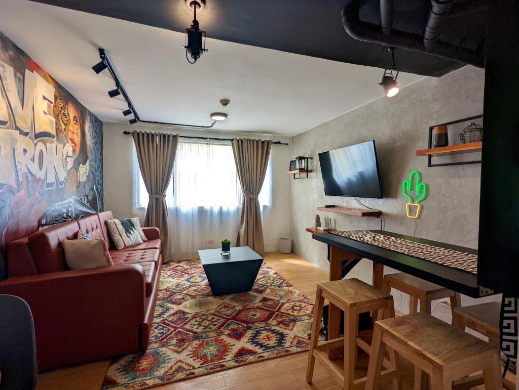 Cozy 1BR Loft for Visiting Families in Cainta Wifi photo 1