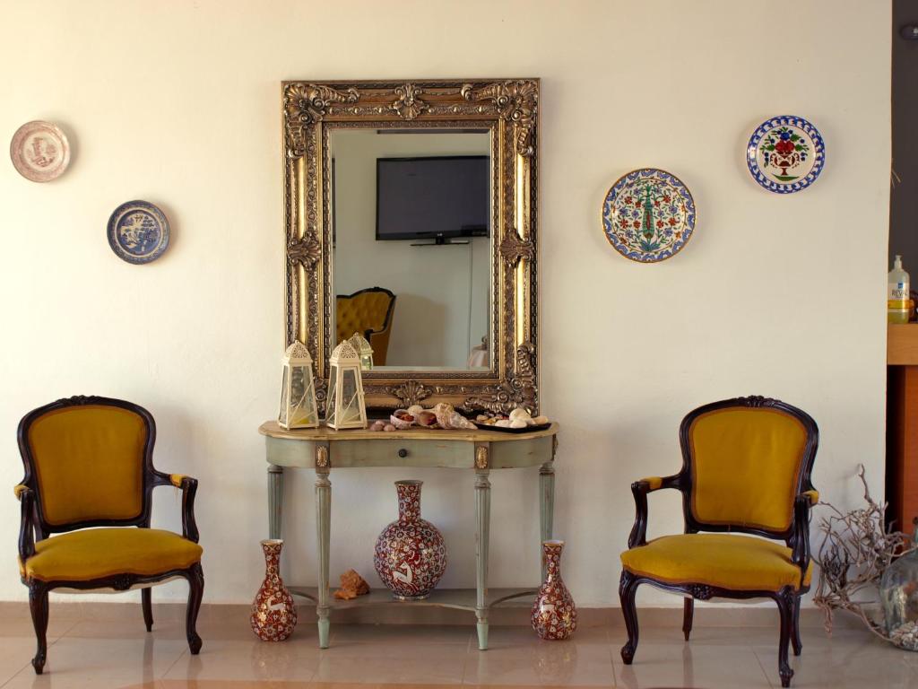 Castellania Hotel Apartments - Tap to explore photos