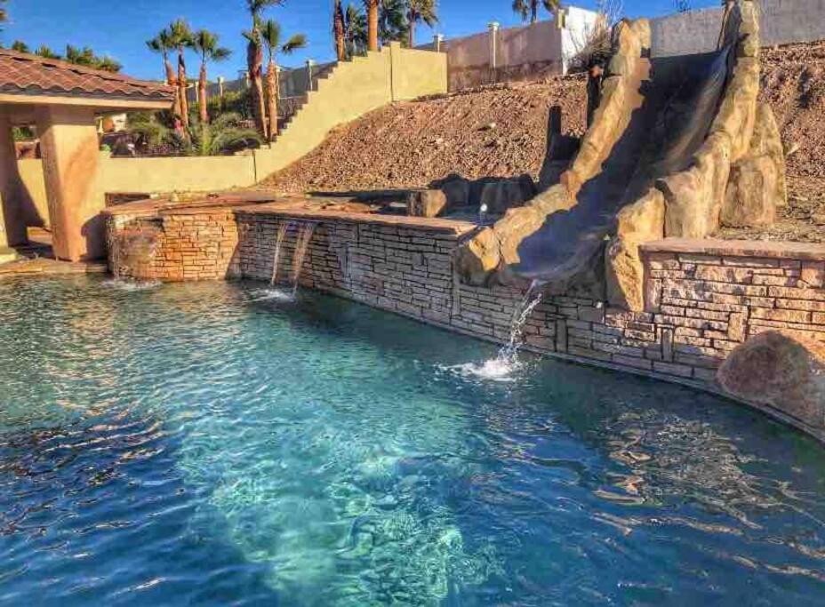 ULTIMATE BACKYARD-POOL/SPA. SLIDE. LAKEVIEW. BALL image