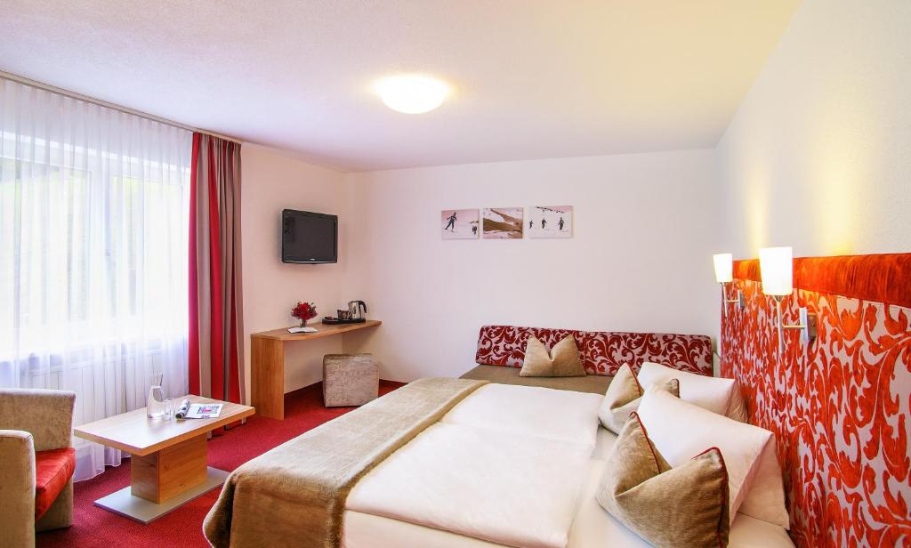 Hotel Chasa Sulai - Tap to explore photos