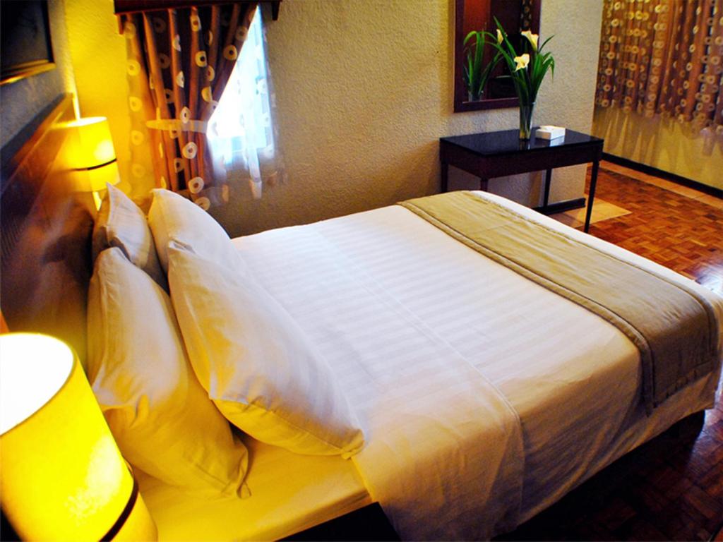Двухместный (Номер Делюкс с кроватью размера «queen-size»), Fersal Hotel - P. Tuazon Cubao