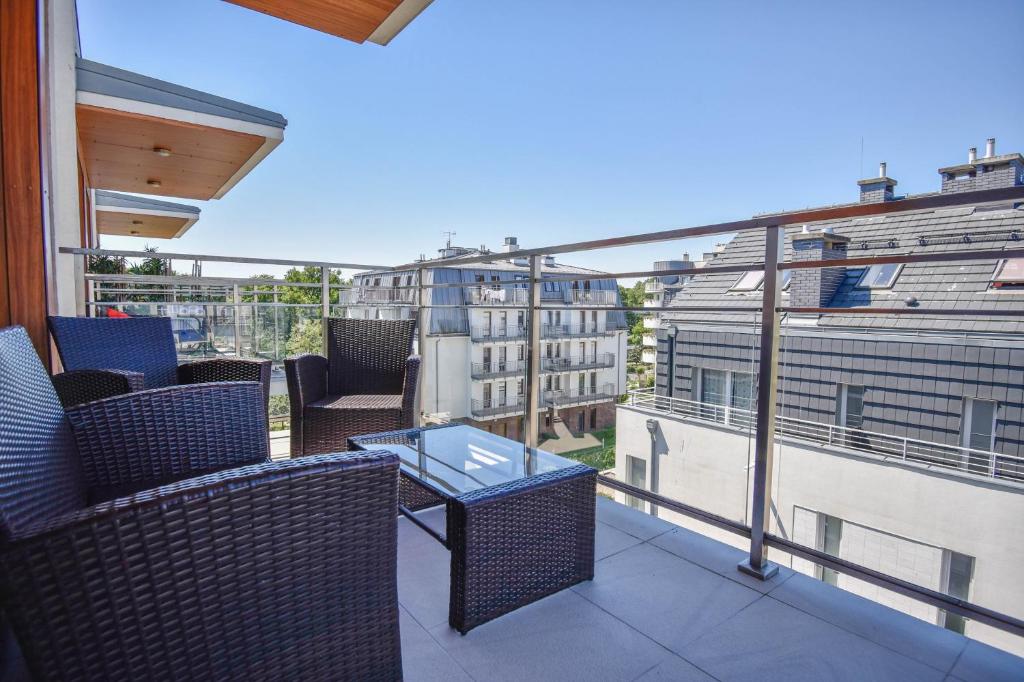 Apartamenty na Wyspie - Villa Pegaz - Parking photo 1