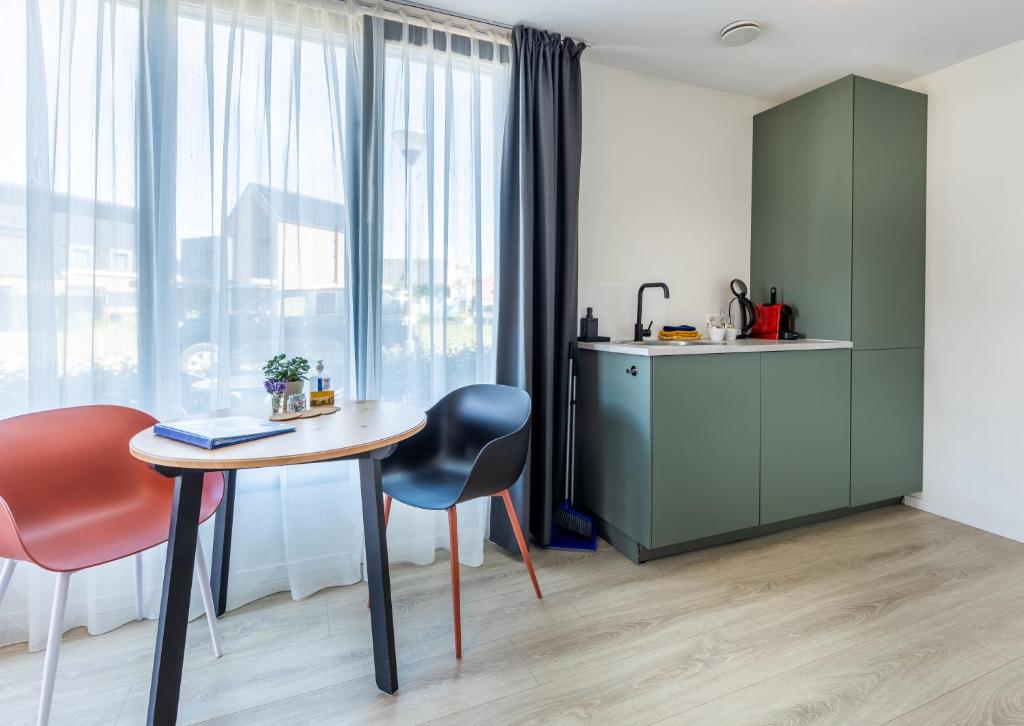 Roosjesweg 2 Luxe gastenkamer 400 meter van strand met parkeerplaats photo 4