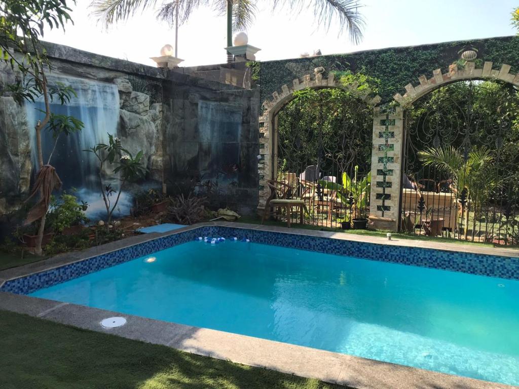 Trio Villa with coverable private pool in compound near Mall of Egypt