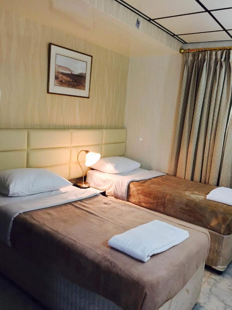 Двухместный (Двухместный номер с 2 отдельными кроватями), Отель West Hotel