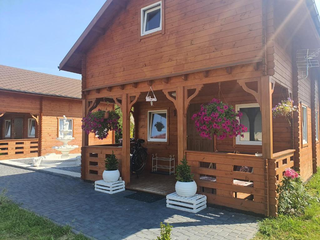 Noclegi "LAS WYPAS" 2 Domki drewniane całoroczne, oraz 1 Apartament dla dwojga - wynajem photo 3