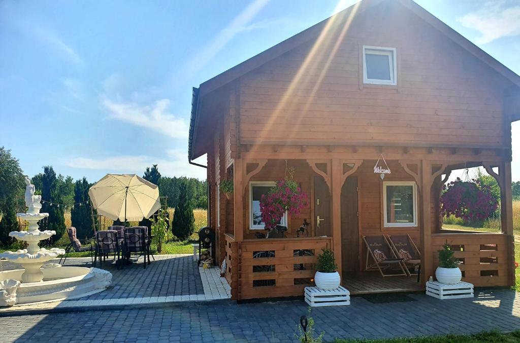 Noclegi "LAS WYPAS" 2 Domki drewniane całoroczne, oraz 1 Apartament dla dwojga - wynajem photo 1