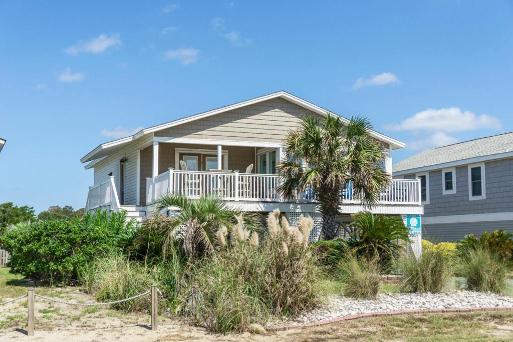 Footprints In The Sand by Oak Island Accommodations image