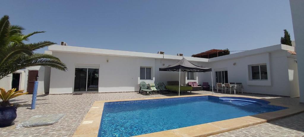 Villa CLIMATISEE avec piscine privée, ras el ma photo 1