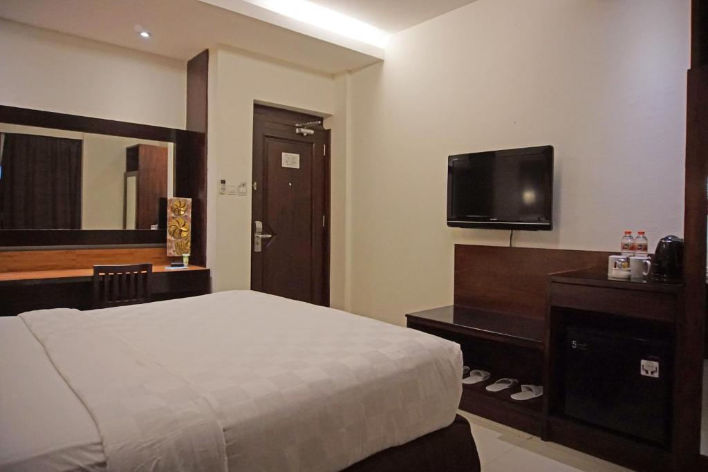 Best Western Kuta Villa - Tap to explore photos