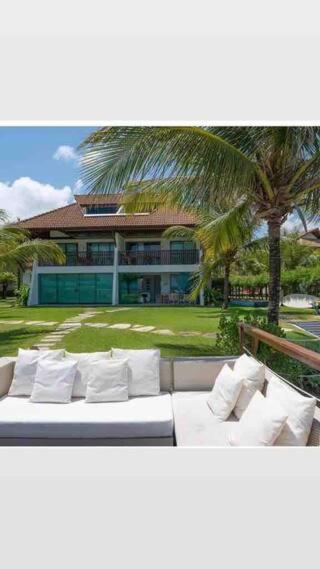 Flat beira mar no Manihi - Muro Alto