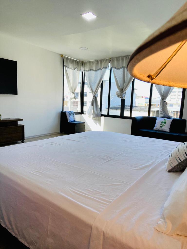 Habitación Ejecutiva cómoda y acogedora - Centro de Manta photo 1