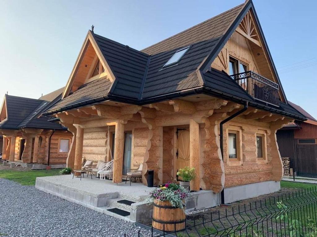 Pod Brzegiem - Domki góralskie photo 2