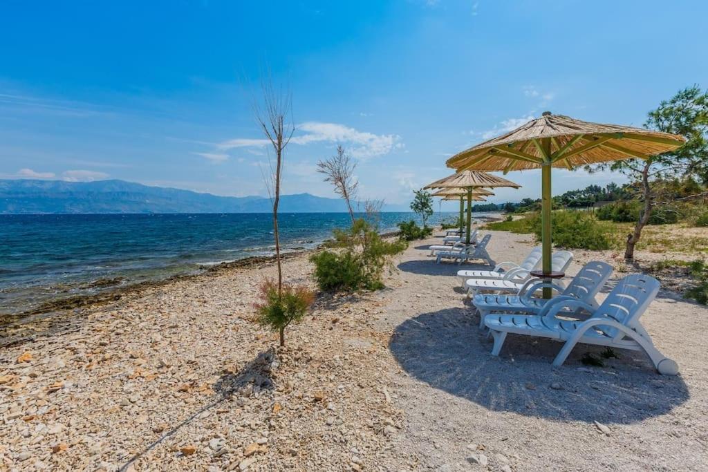 Seaside luxury villa with a swimming pool Supetar, Brac - 12371 photo 3