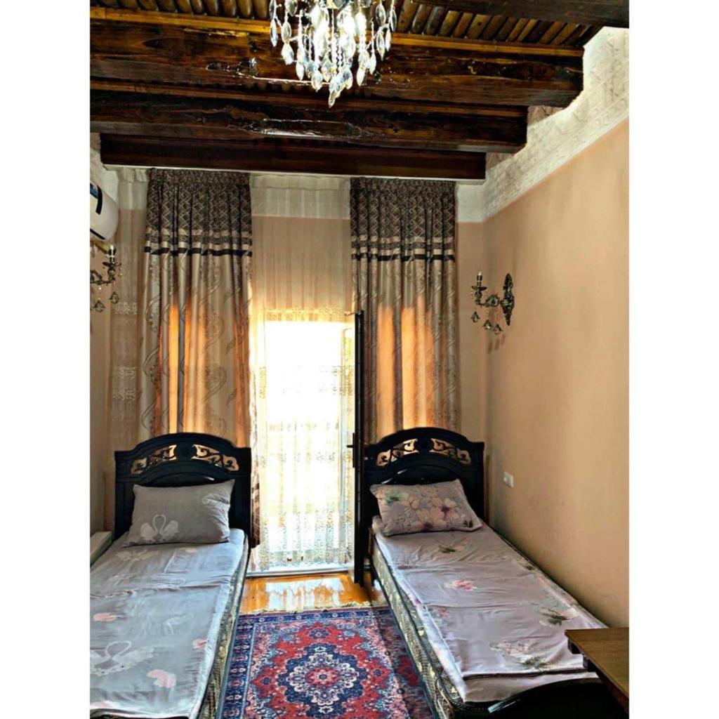 Rahmat guesthouse - Tap to explore photos
