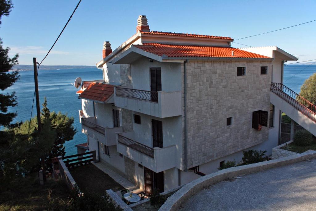 Apartments by the sea Sumpetar, Omis - 4827 photo 1