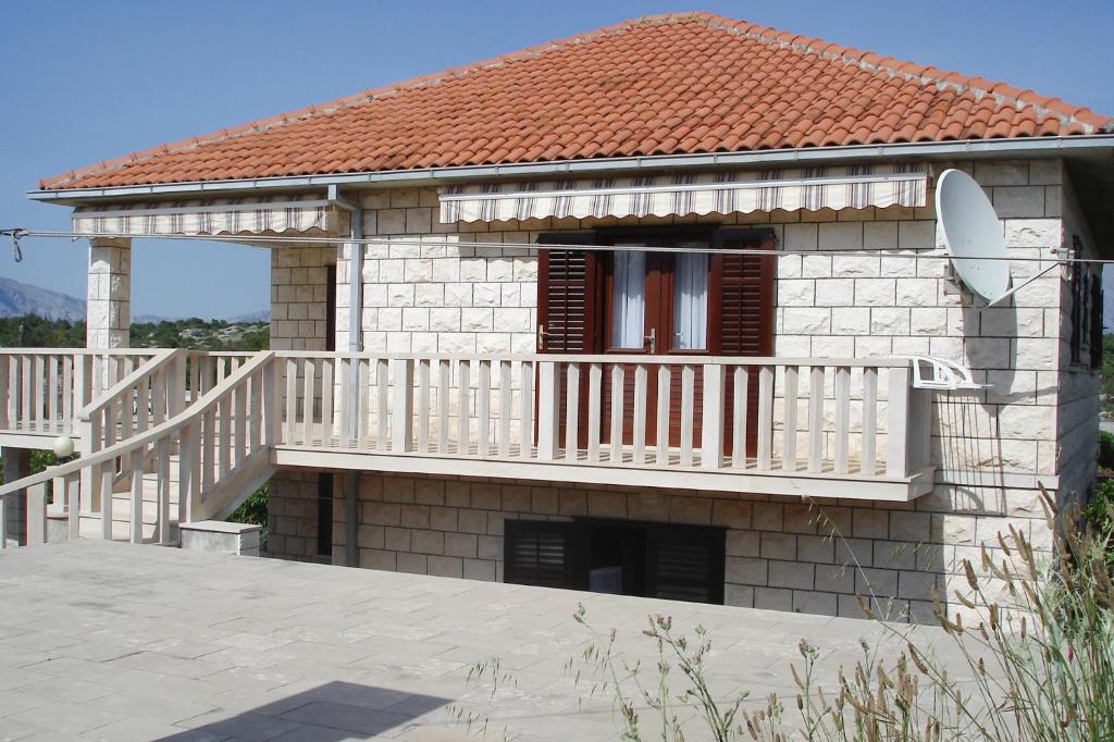 Apartments with a parking space Povlja, Brac - 8628 photo 1