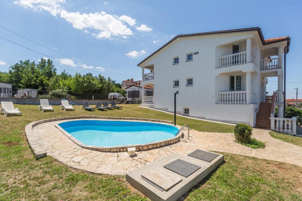 Holiday house with a swimming pool Radmani, Porec - 16440 photo 1