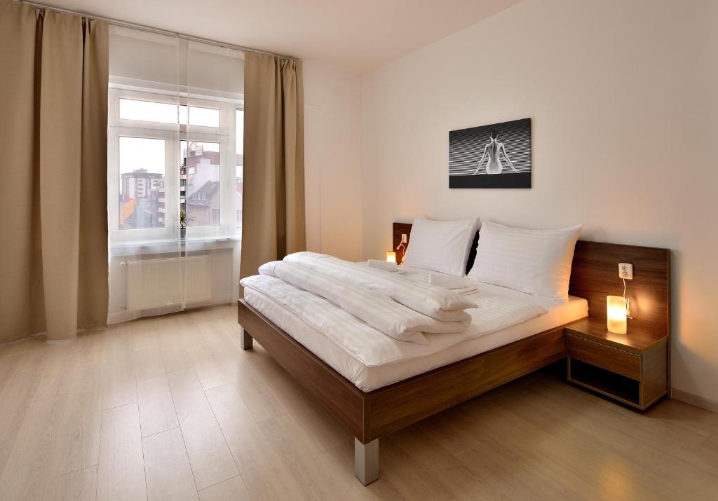 Апартаменты (Апартаменты с 2 спальнями - Namestie SNP 21), Ambiente Serviced Apartments - Namestie SNP