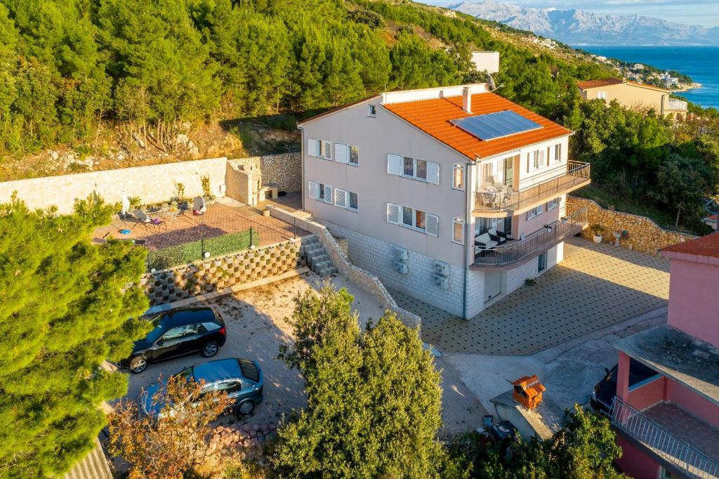 Family friendly apartments with a swimming pool Stanici, Omis - 18676 photo 1