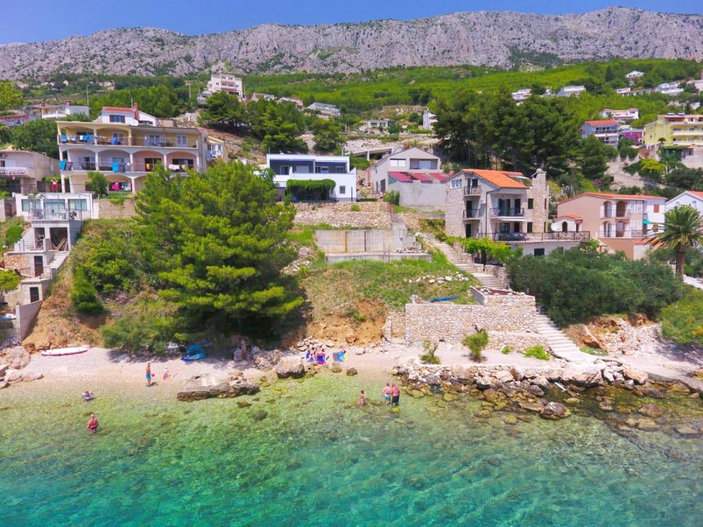 Seaside apartments with a swimming pool Zavode, Omis - 1021 photo 1