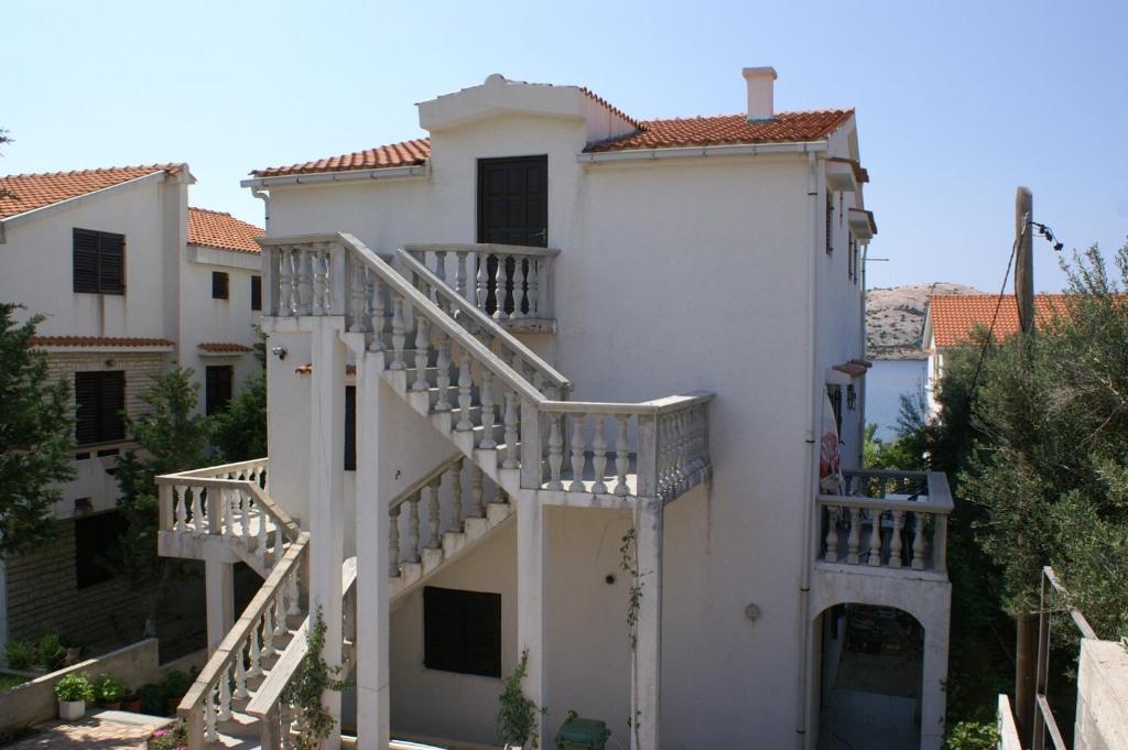 Apartments by the sea Stara Novalja, Pag - 4063 photo 1