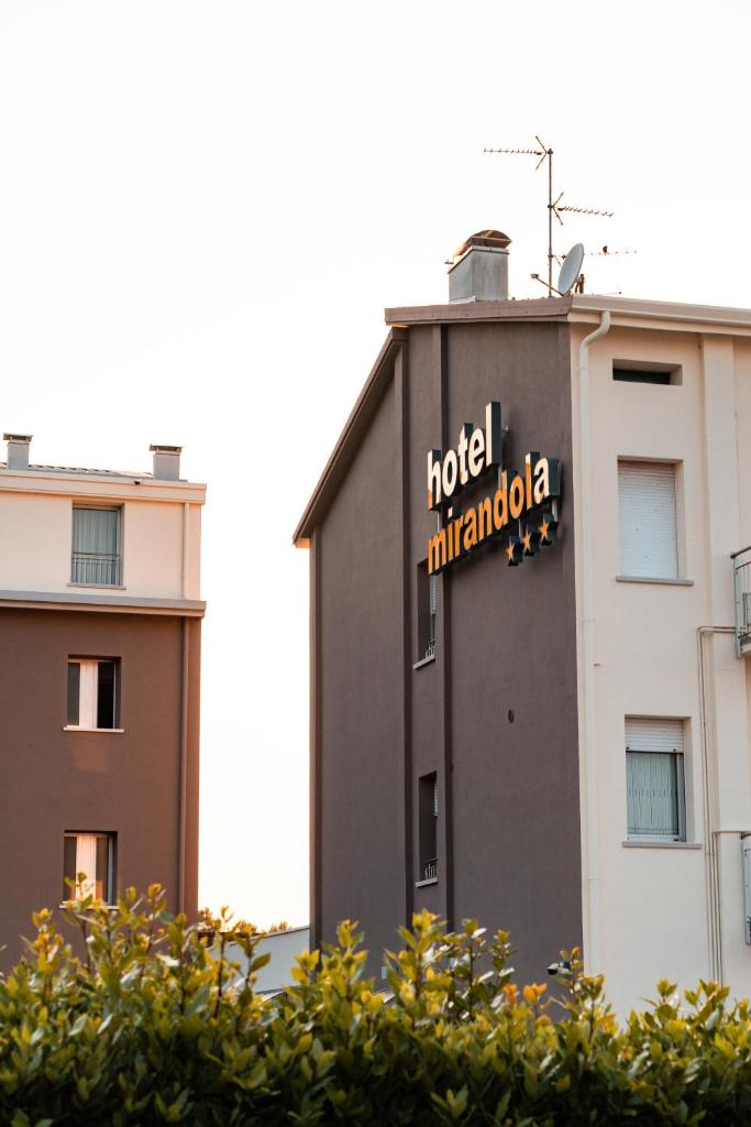 Hotel Mirandola - Tap to explore photos