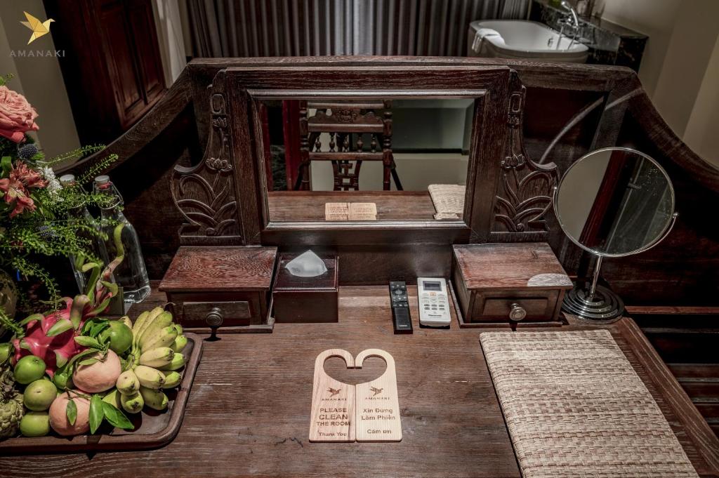 Amanaki Saigon Boutique Hotel - Tap to explore photos