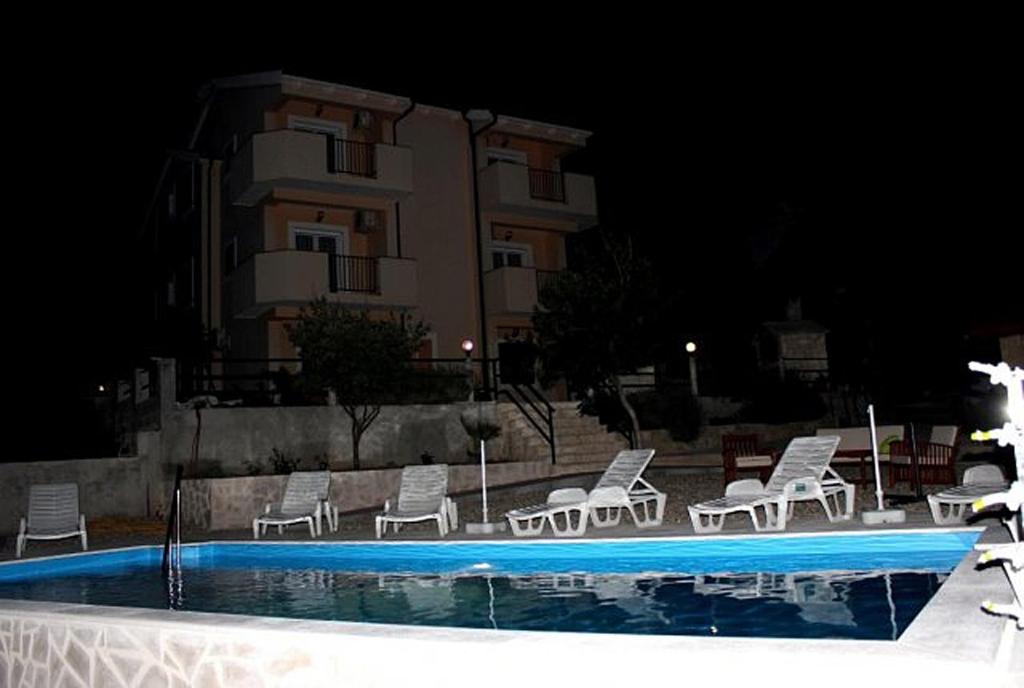 Seaside apartments with a swimming pool Posedarje, Novigrad - 6162 photo 1