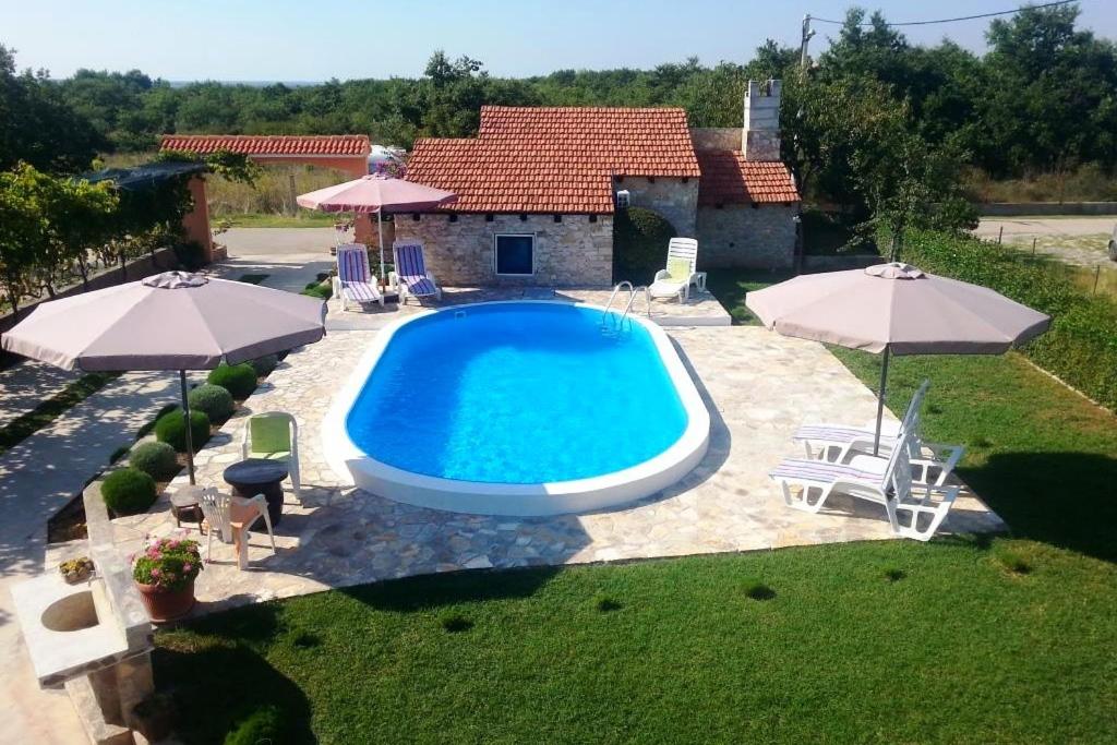 Apartments with a swimming pool Zemunik Donji, Zadar - 6188 photo 4