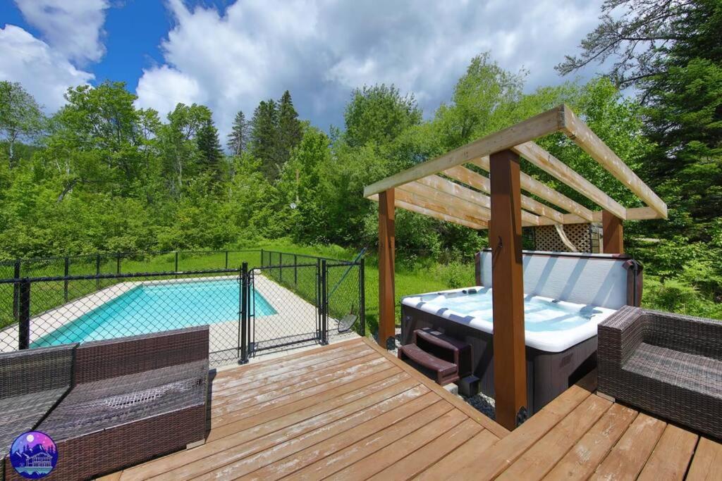 Chalet Le St-Côme - SPA- Billard- PISCINE by Galaxia photo 1