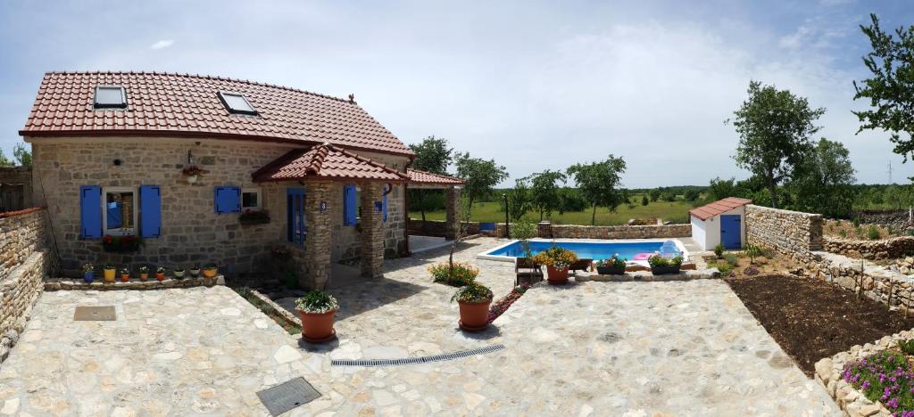 Family friendly house with a swimming pool Puljane, Krka - 11688 photo 1
