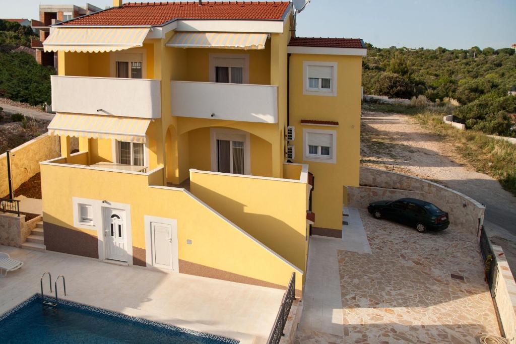 Seaside apartments with a swimming pool Zecevo Rtic, Rogoznica - 11869 photo 1