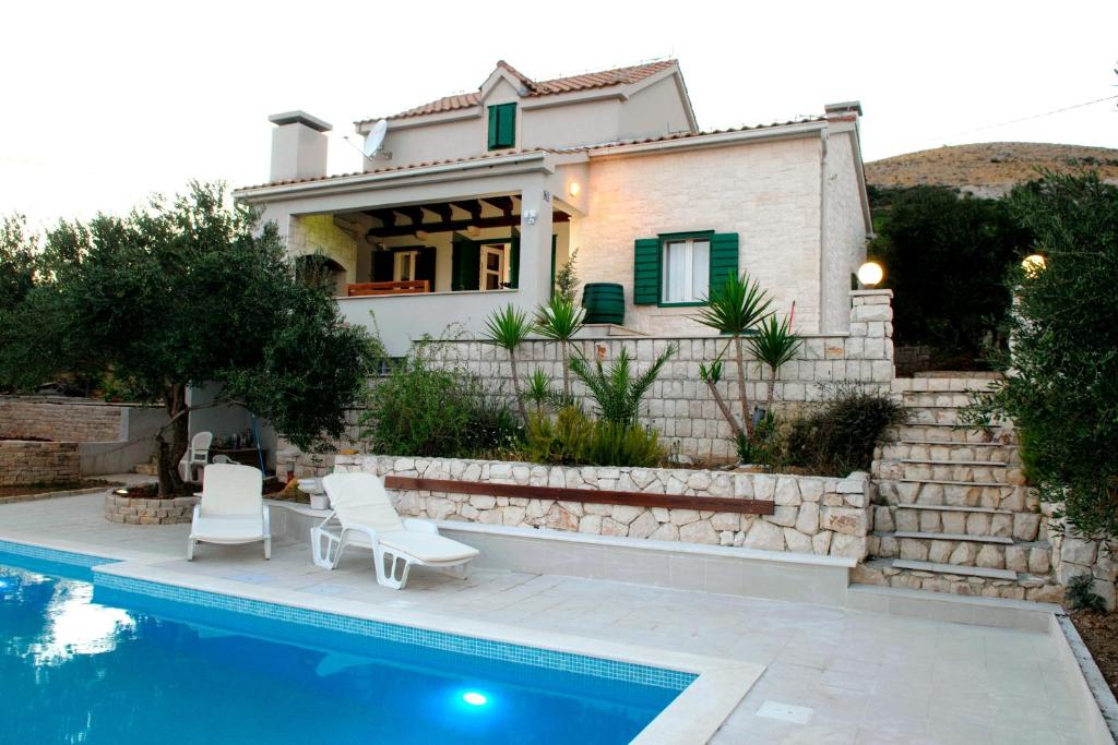 Holiday house with a swimming pool Plano, Trogir - 11897 photo 1