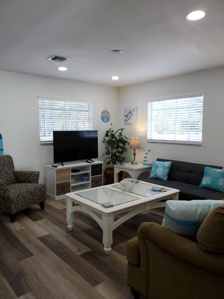 Beach Style lake view home with boat parking & minutes to the best beaches! image