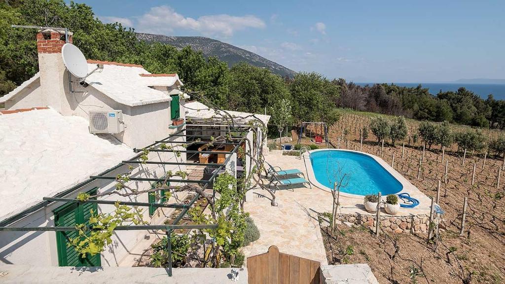 Family friendly house with a swimming pool Bol, Brac - 12228 photo 2