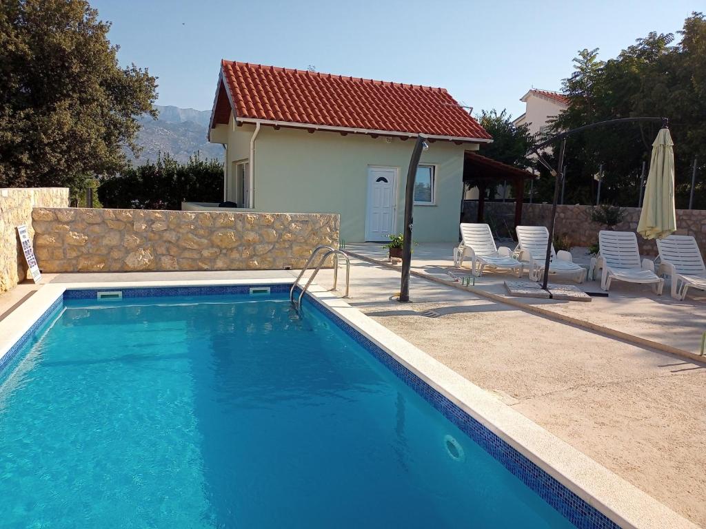 Seaside house with a swimming pool Vinjerac, Zadar - 9689 photo 1