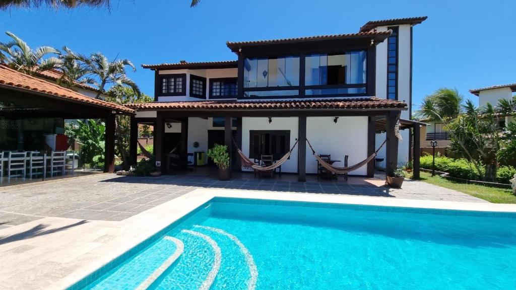 Casa 10 suítes, até 64 pessoas, Praia Ferradura