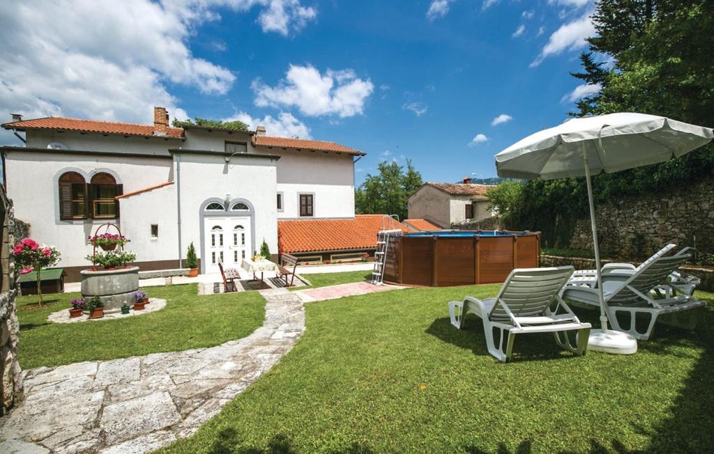 Apartments with a swimming pool Krsan, Central Istria - Sredisnja Istra - 13521 photo 1