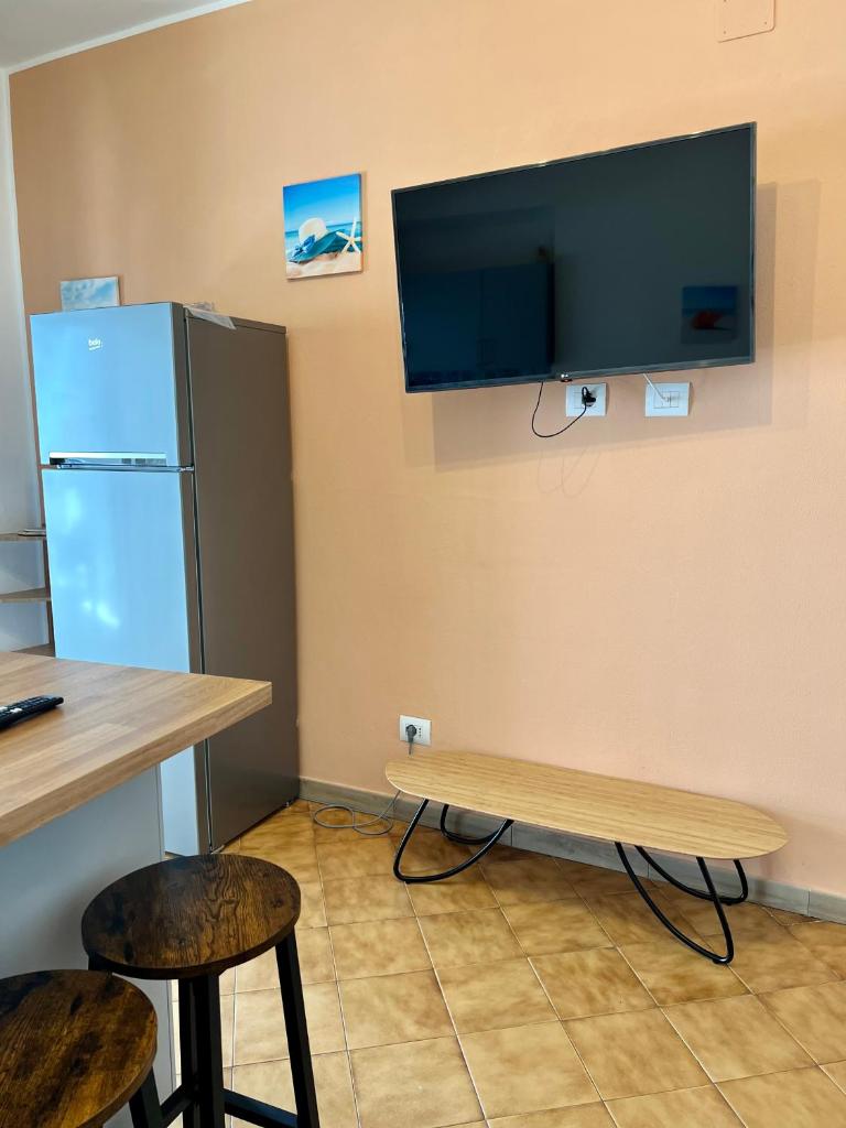 Coral Beach Apartment- Steps from Sea, AC & WIFI - Tap to explore photos