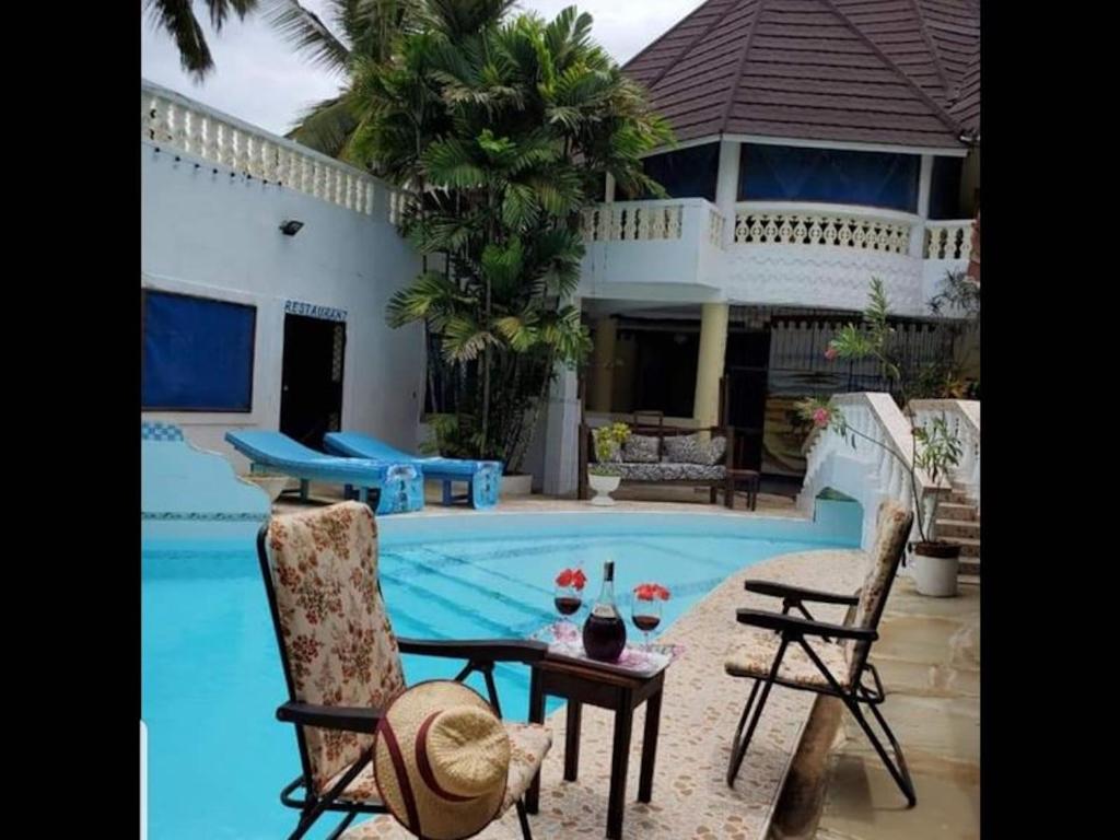 Room in Holiday house - Kivuli Villas We Charge Per Room Per Night photo 1