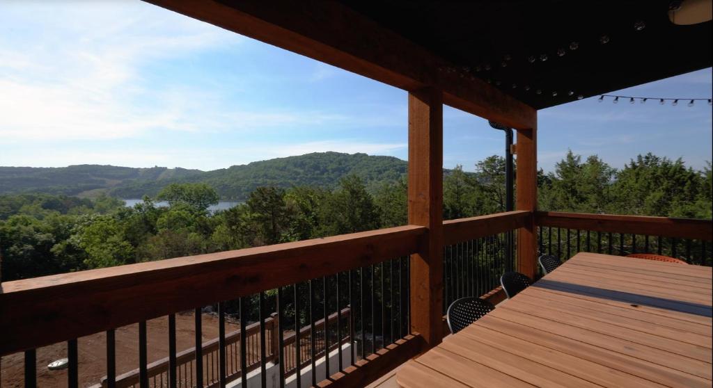 Brand New! Lake View with Arcade Game Room! Fully stocked kitchen! image